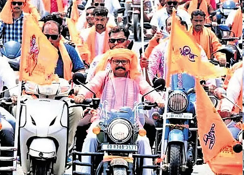 bjd-demands-resignation-of-minister-mukesh-mahaling-for-riding-bike-without-helmet